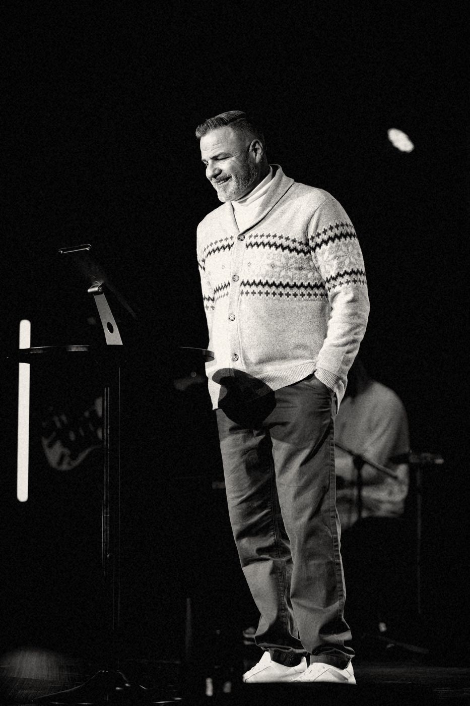 Pastor Dean on stage at Real Life