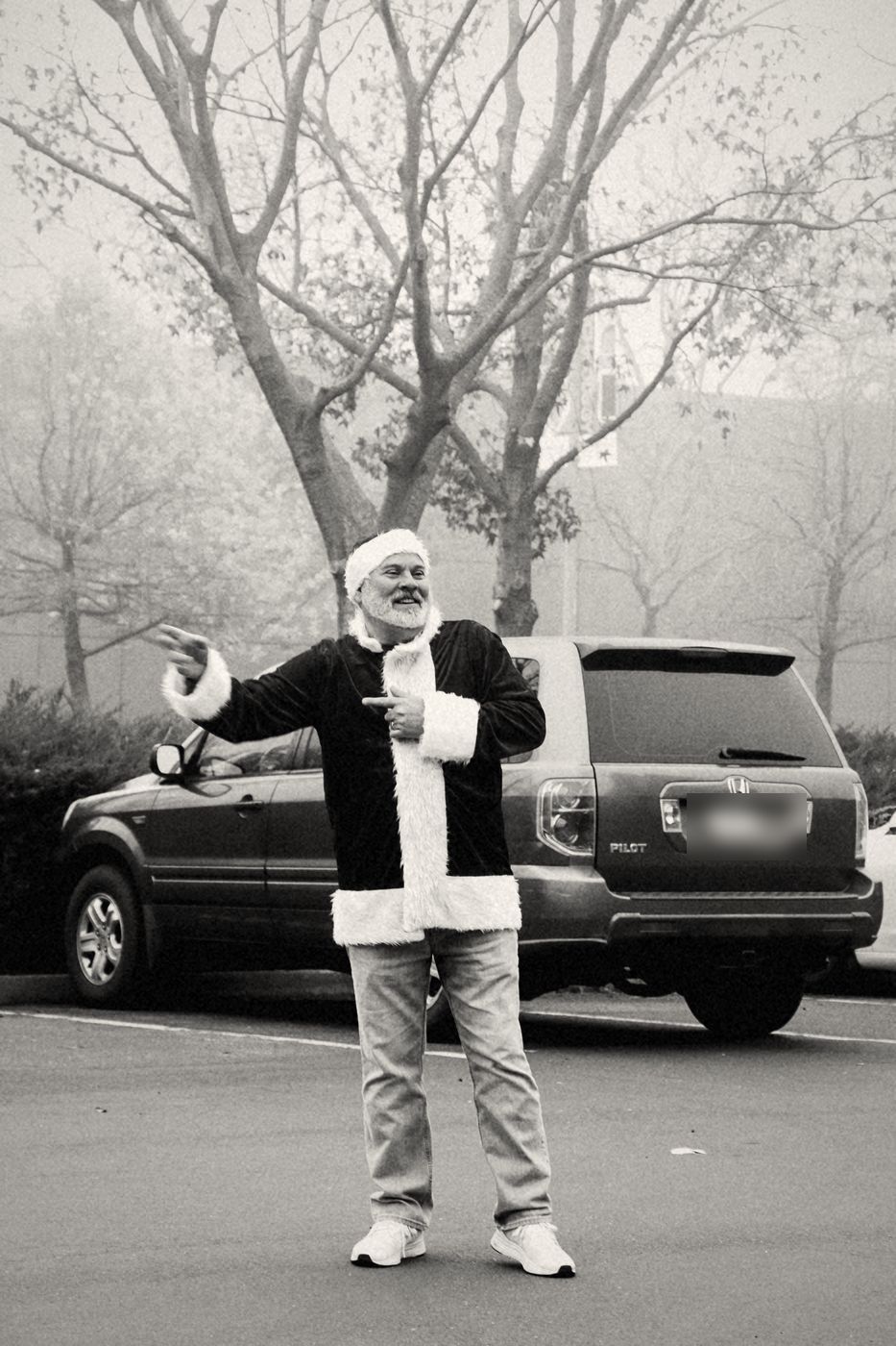 Santa waving in the Real Life parking lot